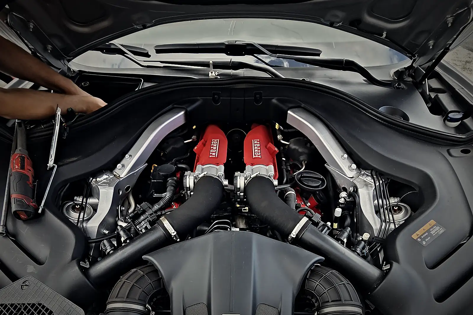 Ferrari Portofino twin-turbo V8 engine bay with red cam covers