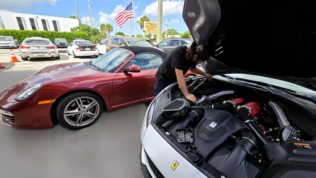 Porsche cabriolet and Ferrari Portofino serviced side by side at Prestige Auto Repairs & Tires, Oakland Park FL
